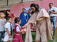 Shoes, biscuits and copies distribution to poor student